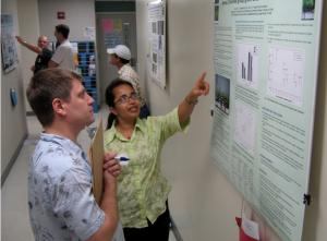 A student presents her poster at the 2009 Student Research Symposium