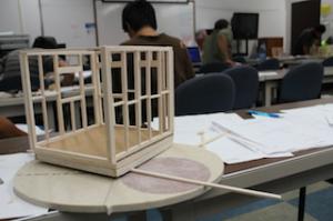 Students building model homes using their CAD skills.