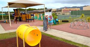 Kahu Nani Hill and Program Director Dana Shelit bless the preschool grounds.