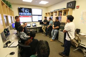 Dr. Matthew A. Chapman and student interns at the UH West O'ahu Cyber Security Coordination Center. 