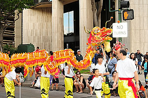  Children with a Chinese dragon. Photo by Milton Diamond  