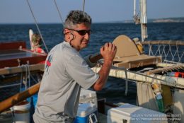 President David Lassner aboard the Hokulea, photo courtesy of the Polynesian Voyaging Society