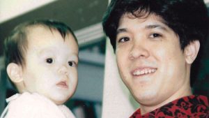 Ken Sato with his son as a baby