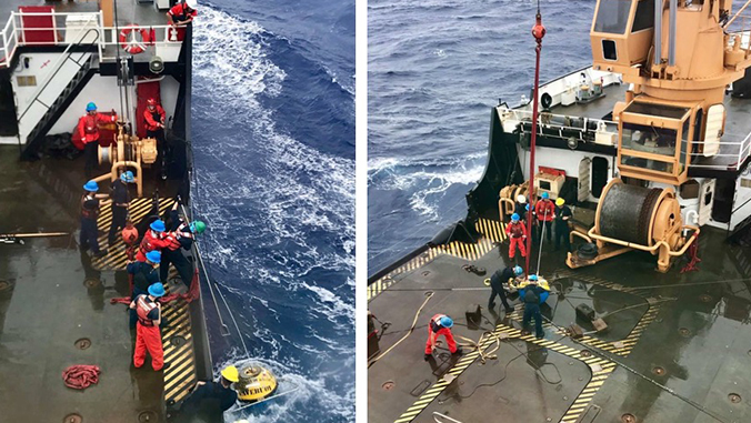 The coast guard crew working to recover the wave buoy onboard the ship.