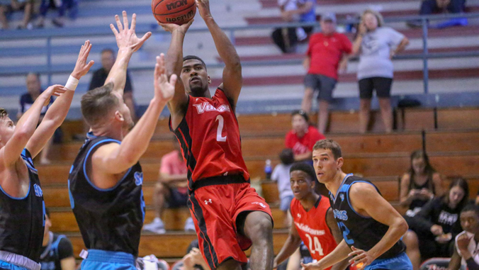 student playing basketball