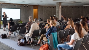 speaker speaking at conference