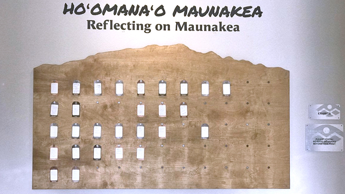 Exhibit with area for people to post notes with "Hoomanao Mauankea, Reflecting on Maunakea"