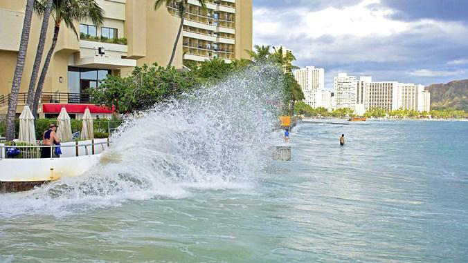 Wave splashing against wall in Waikiki