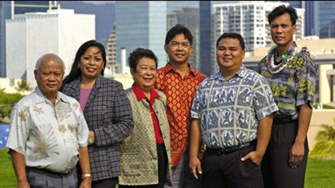 six people looking at camera and smiling