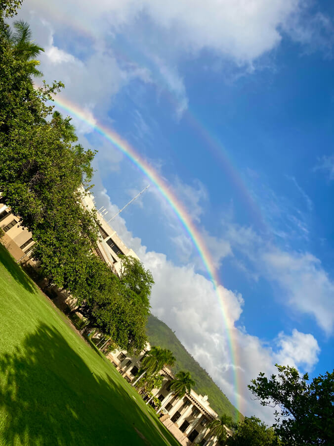 Tilted view of Hawaii Hall with a rainbow