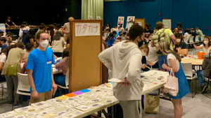 People around tables in the Campus Center Ballroom