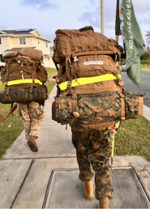 midshipmen carry packs