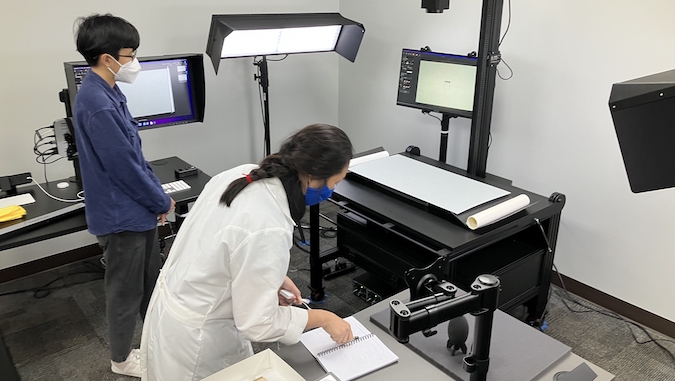 digitization lab with two staff working