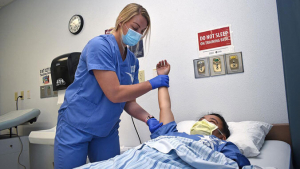 Students training nursing techniques