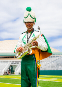 white uniform with white hat and green pants