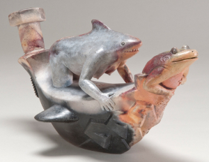 Shark creature with frog creature made of clay