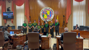 people standing in front of a group of people