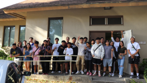 people standing in front of a building