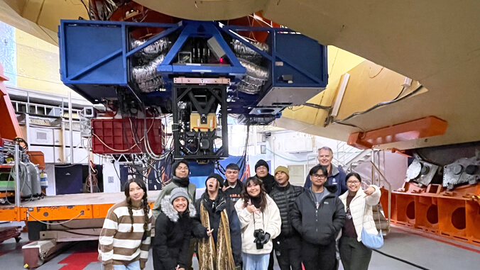 students touring telescope facilities