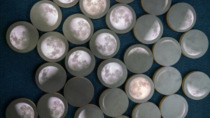 Round pieces with pictures of the moon