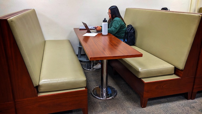 library study booth with student