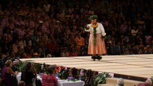 Miss Aloha Hula in front of judges.