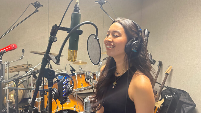Flores recording in the studio