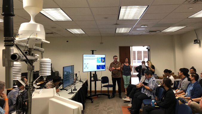 presenting info on a screen to a seated audience