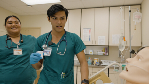 Nursing students help a test patient