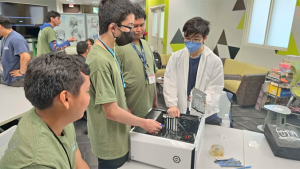 group of people building a computer