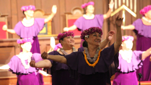 women dancing hula