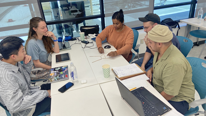 people working on mathematics on a table