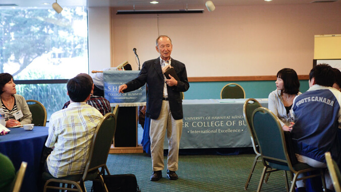 Seo speaking to a group