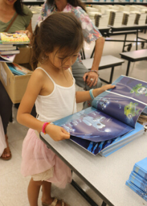 Girl with picture book