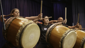 People practicing taiko