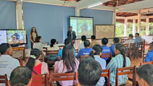 people sitting in a large classroom