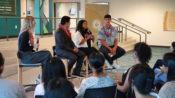 People talking on a panel