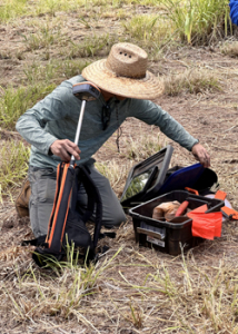 person with tools on the ground