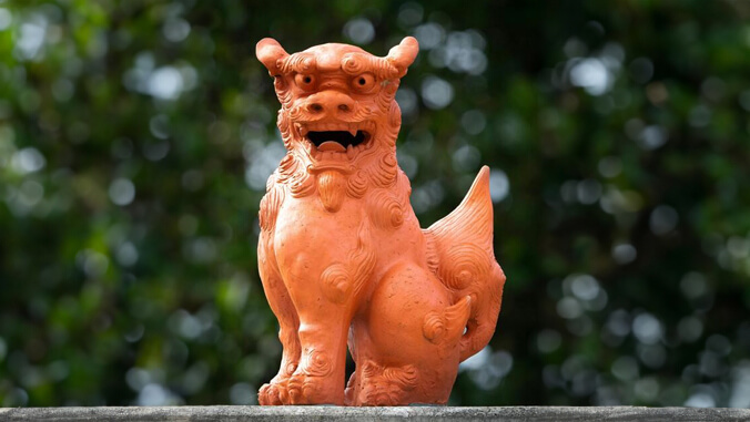 orange shisa statue