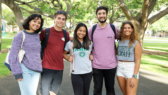 students smiling outside