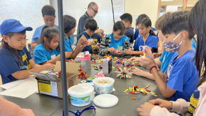 kids making arts and crafts in a group