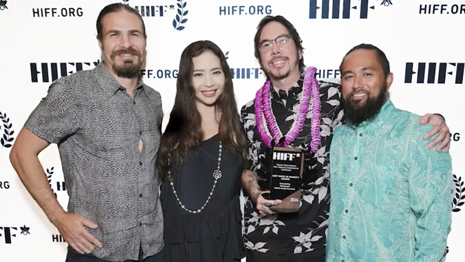 4 people standing in front of H I F F white background