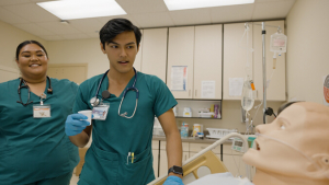 Nursing students with a patient simulation