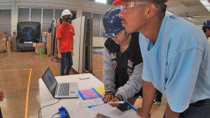 students in front of a computer