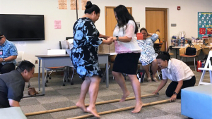 2 people dancing tinikling