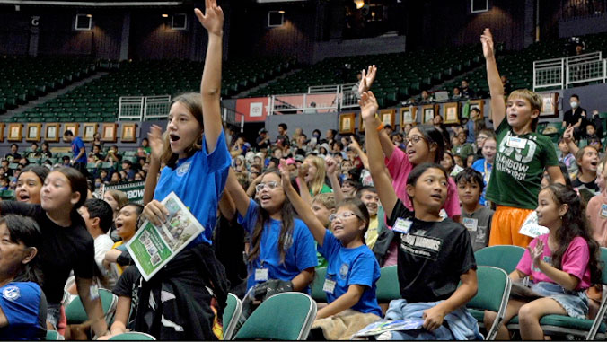 students cheer at game