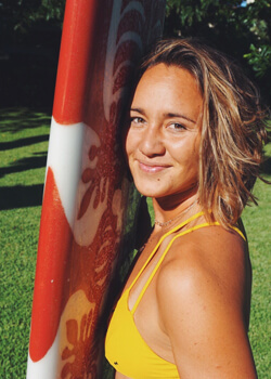 woman holding surfboard