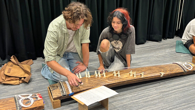 person playing koto