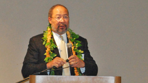 person speaking from a podium