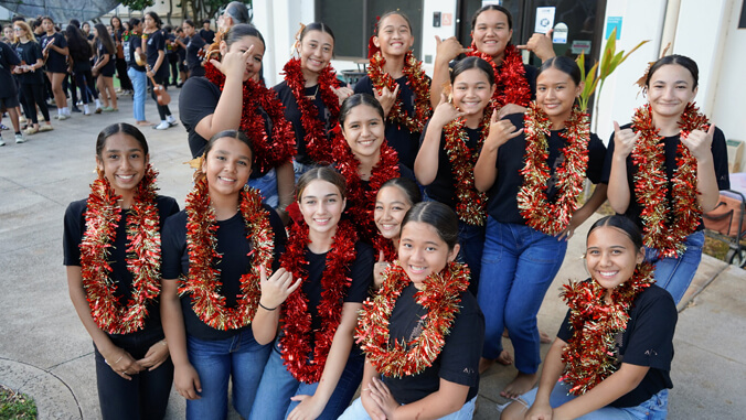 Group of girls with tinsel lei